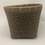Tukano. <em>Round basket</em>. Plant fiber, wood, pigment, 9 3/4 × 11 3/8 × 11 7/16 in. (24.8 × 28.9 × 29.1 cm). Brooklyn Museum, Museum Expedition 1933, Purchased with funds given by Jesse Metcalf, 33.626. Creative Commons-BY (Photo: Brooklyn Museum, CUR.33.626_view01.jpg)