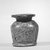  <em>Kohl Pot</em>. Slate, glaze, 2 1/16 x 1 3/4 in. (5.2 x 4.4 cm). Brooklyn Museum, Charles Edwin Wilbour Fund, 33.680. Creative Commons-BY (Photo: Brooklyn Museum, CUR.33.680_NegC_print_bw.jpg)