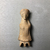 Corinthian. <em>Female Doll</em>, late 6th century B.C.E. Clay, pigment, 3 3/16 × 1 3/16 × 9/16 in. (8.1 × 3 × 1.5 cm). Brooklyn Museum, Charles Edwin Wilbour Fund, 34.1209. Creative Commons-BY (Photo: , CUR.34.1209_view01.jpg)