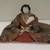  <em>Princess Doll (Ohinasama)</em>. Silk, wood, porcelain, human hair, 7 x 11 1/2 x 6 1/2in. (17.8 x 29.2 x 16.5cm). Brooklyn Museum, Brooklyn Museum Collection, 34.1329. Creative Commons-BY (Photo: Brooklyn Museum, CUR.34.1329_view1.jpg)