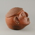 Central Caribbean. <em>Trophy Head</em>, 500-1000. Ceramic, pigments, 6 5/16 x 7 1/2 in. (16 x 19.1 cm). Brooklyn Museum, Alfred W. Jenkins Fund, 34.2231. Creative Commons-BY (Photo: Brooklyn Museum, CUR.34.2231_side.jpg)