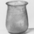 Roman. <em>Tumbler</em>, 3rd century C.E. Glass, 3 7/16 x greatest diam. 2 3/4 in. (8.8 x 7 cm). Brooklyn Museum, Brooklyn Museum Collection, 34.5588. Creative Commons-BY (Photo: Brooklyn Museum, CUR.34.5588_negA_bw.jpg)