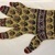  <em>Pair of Man's Gloves</em>. Yellow knitted purl stitch wool, L 25cm. Brooklyn Museum, Brooklyn Museum Collection, 34.5761. Creative Commons-BY (Photo: Brooklyn Museum, CUR.34.5761_component02_back.jpg)