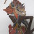  <em>Shadow Play Figure (Wayang kulit)</em>. Leather, pigment, wood, fiber, 10 1/4 × 13 in. (26 × 33 cm). Brooklyn Museum, Brooklyn Museum Collection, 34.63. Creative Commons-BY (Photo: , CUR.34.63_detail1.jpg)