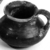 Attic. <em>Miniature Vase</em>, early 4th century B.C.E. Clay, slip, 1 x Diam. 1 1/4 in. (2.5 x 3.2 cm). Brooklyn Museum, Charles Edwin Wilbour Fund, 34.720. Creative Commons-BY (Photo: , CUR.34.720_Neg34.720GRPA_print_cropped.bw.jpg)