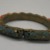  <em>Bracelet</em>, 19th century. gilded brass, coral, kingfisher feather, 2 15/16 x 3/8 x 3 9/16 in. (7.5 x 1 x 9 cm). Brooklyn Museum, Brooklyn Museum Collection, 34.945. Creative Commons-BY (Photo: Brooklyn Museum, CUR.34.945_view2.jpg)