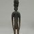 Rapanui. <em>Standing Male Figure (Moai Kavakava)</em>. Wood, bead or shell, 15 1/2 x 3 1/4 x 2 1/4 in. (39.4 x 8.3 x 5.7 cm). Brooklyn Museum, George C. Brackett Fund, 34.998. Creative Commons-BY (Photo: Brooklyn Museum, CUR.34.998_back.jpg)