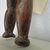 Rapanui. <em>Standing Male Figure (Moai Kavakava)</em>. Wood, bead or shell, 15 1/2 x 3 1/4 x 2 1/4 in. (39.4 x 8.3 x 5.7 cm). Brooklyn Museum, George C. Brackett Fund, 34.998. Creative Commons-BY (Photo: , CUR.34.998_detail07.jpg)