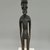 Rapanui. <em>Standing Male Figure (Moai Kavakava)</em>. Wood, bead or shell, 15 1/2 x 3 1/4 x 2 1/4 in. (39.4 x 8.3 x 5.7 cm). Brooklyn Museum, George C. Brackett Fund, 34.998. Creative Commons-BY (Photo: Brooklyn Museum, CUR.34.998_front.jpg)