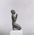  <em>Figure of a Kneeling Priest</em>, ca. 664-332 B.C.E. Bronze, 3 1/8 × 1 1/16 × 1 1/4 in. (7.9 × 2.7 × 3.2 cm). Brooklyn Museum, Charles Edwin Wilbour Fund, 35.1031. Creative Commons-BY (Photo: Brooklyn Museum, CUR.35.1031_NegB_print_bw.jpg)