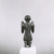  <em>Figure of a Kneeling Priest</em>, ca. 664-332 B.C.E. Bronze, 3 1/8 × 1 1/16 × 1 1/4 in. (7.9 × 2.7 × 3.2 cm). Brooklyn Museum, Charles Edwin Wilbour Fund, 35.1031. Creative Commons-BY (Photo: Brooklyn Museum, CUR.35.1031_NegC_print_bw.jpg)