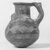 Cypriot. <em>Jug with Wide Neck</em>, 1925-1800 B.C.E. Clay, slip, 3 1/2 × Diam. 2 11/16 in. (8.9 × 6.8 cm). Brooklyn Museum, Brooklyn Museum Collection, 35.1063. Creative Commons-BY (Photo: Brooklyn Museum, CUR.35.1063_NegA_print_bw.jpg)