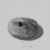  <em>Diskoid Seal or Stamp</em>. Steatite, glaze, Diam. 11/16 in. (1.8 cm). Brooklyn Museum, Gift of Theodora Wilbour from the collection of her father, Charles Edwin Wilbour, 35.1166. Creative Commons-BY (Photo: , CUR.35.1166_NegID_35.1108GRPB_print_cropped_bw.jpg)