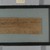  <em>Papyrus Fragment Inscribed in Greek</em>, 7th or 8th century C.E. Papyrus, ink, Glass: 6 3/4 x 11 13/16 in. (17.2 x 30 cm). Brooklyn Museum, Gift of Theodora Wilbour, 35.1471 (Photo: Brooklyn Museum, CUR.35.1471_verso_IMLS_PS5.jpg)