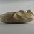  <em>Fragment of a Ushabti of Akhenaten</em>, ca. 1352-1336 B.C.E. Limestone, 5 1/8 x 2 13/16 x 1 7/8 in. (13 x 7.1 x 4.7 cm). Brooklyn Museum, Charles Edwin Wilbour Fund, 35.1876. Creative Commons-BY (Photo: Brooklyn Museum, CUR.35.1876_view2.jpg)