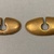 Quimbaya. <em>Nose Ornaments</em>, 300 BCE–700 CE. Gold, a: 1 × 1 13/16 × 1/8 in. (2.5 × 4.6 × 0.3 cm). Brooklyn Museum, Alfred W. Jenkins Fund, 35.194a-b. Creative Commons-BY (Photo: Brooklyn Museum, CUR.35.194a-b.jpg)