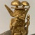  <em>Gold Idol Seated Holding a Sceptre in Each Hand with Double Mushroom Headdress</em>. Gold, 2 5/8in. (6.7cm). Brooklyn Museum, Alfred W. Jenkins Fund, 35.195. Creative Commons-BY (Photo: Brooklyn Museum, CUR.35.195_detail02.jpg)
