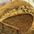  <em>Mask (Tatanua)</em>, 19th century. Wood, rattan, barkcloth, fiber, seeds, sea sponge, tapestry turban snail (Turbo petholatus) opercula, pigment, 13 × 14 × 10 in. (33 × 35.6 × 25.4 cm). Brooklyn Museum, Gift of Russell Sturgis, 35.2212. Creative Commons-BY (Photo: , CUR.35.2212_detail06.jpg)