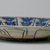  <em>Large Plate</em>, 17th century. Ceramic, Kubachi ware; fritware, painted in olive green, cobalt blue and green with red and yellow slips under a transparent glaze, 2 1/2 x 13 9/16 in. (6.4 x 34.4 cm). Brooklyn Museum, Gift of Frank L. Babbott, 35.677. Creative Commons-BY (Photo: Brooklyn Museum, CUR.35.677_exterior.jpg)