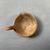  <em>Minyan Bowl</em>, ca. 2500 B.C. Clay, 1 5/16 × 2 5/16 × 2 3/4 in. (3.4 × 5.9 × 7 cm). Brooklyn Museum, Charles Edwin Wilbour Fund, 35.763. Creative Commons-BY (Photo: Brooklyn Museum, CUR.35.763_view03.jpg)