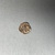Greek. <em>Golden Disc</em>, ca. 1600 B.C.E. Gold, 35.781-35.806a-c: Greatest diam: 1 1/4 in. (3.1 cm). Brooklyn Museum, Charles Edwin Wilbour Fund, 35.799. Creative Commons-BY (Photo: Brooklyn Museum, CUR.35.799_back.JPG)