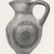 Cypriot. <em>Miniature Oinochoe</em>, 600-475 B.C.E. Terracotta, slip, 2 1/4 × Diam. 1 7/16 in. (5.7 × 3.7 cm). Brooklyn Museum, Brooklyn Museum Collection, 35.821. Creative Commons-BY (Photo: Brooklyn Museum, CUR.35.821_print_NegA_bw.jpg)