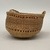 Northwest Coast. <em>Basket with Braided Handle</em>, early 20th century. Plant fiber, sweetgrass, 2 3/4 × 4 1/4 × 4 1/8 in. (7 × 10.8 × 10.5 cm). Brooklyn Museum, Gift of Edith E. Dexter, 36.109. Creative Commons-BY (Photo: Brooklyn Museum, CUR.36.109_back.jpg)