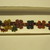 Nasca. <em>Mantle, Border, Fragment</em>, 200-600. Camelid fiber, 1 1/4 × 1/8 × 17 5/16 in. (3.2 × 0.3 × 44 cm). Brooklyn Museum, Gift of Mrs. Eugene Schaefer, 36.395. Creative Commons-BY (Photo: , CUR.36.395_detail02.jpg)