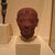  <em>High Priest as King (?)</em>, ca. 1070-945 B.C.E. Quartzite, 4 7/16 x 2 7/8 x 3 1/4 in. (11.3 x 7.3 x 8.3 cm). Brooklyn Museum, Charles Edwin Wilbour Fund, 36.835. Creative Commons-BY (Photo: Brooklyn Museum, CUR.36.835_wwg8_2014.jpg)