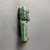  <em>Amun-Min Amulet</em>, 664-343 B.C.E. Faience, 1 3/4 x 5/8 x 9/16 in. (4.5 x 1.6 x 1.5 cm). Brooklyn Museum, Charles Edwin Wilbour Fund, 37.1035E. Creative Commons-BY (Photo: , CUR.37.1035E_view03.jpg)