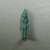 <em>Amulet of Horus in Double Crown</em>, 664–332 B.C.E. Faience, 1 3/16 x 1/4 x 3/8 in. (3 x 0.7 x 0.9 cm). Brooklyn Museum, Charles Edwin Wilbour Fund, 37.1043E. Creative Commons-BY (Photo: Brooklyn Museum, CUR.37.1043E_view1.jpg)