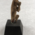  <em>Small Figure of a Monkey</em>, a. 1539-1292 B.C.E. Wood, 2 1/16 × 9/16 × 13/16 in. (5.2 × 1.4 × 2.1 cm). Brooklyn Museum, Charles Edwin Wilbour Fund, 37.1224E. Creative Commons-BY (Photo: , CUR.37.1224E_view03.jpg)