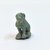  <em>Squatting Cat Amulet</em>, 664-343 B.C.E. Faience, 15/16 x 7/16 x 11/16 in. (2.4 x 1.1 x 1.7 cm). Brooklyn Museum, Charles Edwin Wilbour Fund, 37.1284E. Creative Commons-BY (Photo: Brooklyn Museum, CUR.37.1284E_view3.jpg)