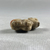  <em>Amulet of a Quadruped</em>. Ivory (?), 5/8 × 15/16 × 3/8 in. (1.6 × 2.4 × 0.9 cm). Brooklyn Museum, Charles Edwin Wilbour Fund, 37.1343E. Creative Commons-BY (Photo: , CUR.37.1343E_view07.jpg)