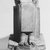  <em>Seated Statue of Imhotep</em>, 664-332 B.C.E. Limestone, 13 3/8 x 8 x 12 13/16 in. (34 x 20.3 x 32.5 cm). Brooklyn Museum, Charles Edwin Wilbour Fund, 37.1356E. Creative Commons-BY (Photo: Brooklyn Museum, CUR.37.1356E_NegID_L647_10A_print_bw.jpg)