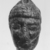  <em>Head Bead</em>, 4th century B.C.E. Glass, 7/16 x 3/4 in. (1.1 x 1.9 cm). Brooklyn Museum, Gift of Carl Wynn Browne, 37.140. Creative Commons-BY (Photo: Brooklyn Museum, CUR.37.140_grpA_bw.jpg)
