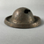  <em>Circular Object</em>, 664–332 B.C.E. Bronze, 1 9/16 x 3 5/8 in. (4 x 9.2 cm). Brooklyn Museum, Charles Edwin Wilbour Fund, 37.1428E. Creative Commons-BY (Photo: Brooklyn Museum, CUR.37.1428E_view02.jpg)