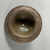  <em>Circular Object</em>, 664–332 B.C.E. Bronze, 1 9/16 x 3 5/8 in. (4 x 9.2 cm). Brooklyn Museum, Charles Edwin Wilbour Fund, 37.1428E. Creative Commons-BY (Photo: Brooklyn Museum, CUR.37.1428E_view03.jpg)