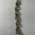  <em>Chain Ending in Heart Amulet</em>. Bronze, 2 3/8 x 9 1/8 in. (6.1 x 23.2 cm). Brooklyn Museum, Charles Edwin Wilbour Fund, 37.1458E. Creative Commons-BY (Photo: Brooklyn Museum, CUR.37.1458E_view02.jpg)