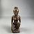  <em>Seated Female Figurine</em>, ca. 838–332 B.C.E. Wood, 4 7/16 × 1 7/8 × 1 3/4 in. (11.2 × 4.8 × 4.4 cm). Brooklyn Museum, Charles Edwin Wilbour Fund, 37.1527E. Creative Commons-BY (Photo: Brooklyn Museum, CUR.37.1527E_front.JPG)