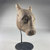 <em>Small Bull's Head</em>, 664-332 B.C.E. Wood, plaster, pigment, 6 3/4 × 2 15/16 × 4 15/16 in. (17.2 × 7.5 × 12.6 cm). Brooklyn Museum, Charles Edwin Wilbour Fund, 37.1562E. Creative Commons-BY (Photo: Brooklyn Museum, CUR.37.1562E_view03.jpg)