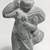  <em>Figure of a Monkey Holding Sack Over His Shoulder</em>, 305–30 B.C.E. Terracotta, pigment, 3 3/8 x 2 x 7/8 in. (8.5 x 5.1 x 2.2 cm). Brooklyn Museum, Charles Edwin Wilbour Fund, 37.1623E. Creative Commons-BY (Photo: Brooklyn Museum, CUR.37.1623E_NegB_print_bw.jpg)