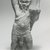  <em>Satyr Holding a Jar</em>, ca. 30 B.C.E.–395 C.E. Clay, pigment, 7 3/16 x 3 1/16 x 1 11/16 in. (18.2 x 7.8 x 4.3 cm). Brooklyn Museum, Charles Edwin Wilbour Fund, 37.1634E. Creative Commons-BY (Photo: Brooklyn Museum, CUR.37.1634E_NegB_print_bw.jpg)