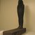  <em>Mummiform Figure</em>, ca. 1075-656 B.C.E. Wood, plaster, bitumen, linen, 14 9/16 x 3 9/16 x 10 3/8 in. (37 x 9 x 26.4 cm). Brooklyn Museum, Charles Edwin Wilbour Fund, 37.1717E. Creative Commons-BY (Photo: Brooklyn Museum, CUR.37.1717E.jpg)