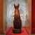  <em>Cat (Bastet)</em>, 305 B.C.E.-1st century C.E. Wood (most likely sycamore fig - Ficus sycomorus L.), gold leaf, gesso, bronze, copper, pigment, rock crystal, glass, 26 3/8 x 7 1/4 x 19 in. (67 x 18.4 x 48.3 cm). Brooklyn Museum, Charles Edwin Wilbour Fund, 37.1945E. Creative Commons-BY (Photo: Brooklyn Museum, CUR.37.1945E_37.1157E_view3_divinefelines_2013.jpg)