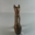  <em>Small Figure of a Cat</em>, 664-332 B.C.E. Wood, 6 1/8 x 1 3/4 x 3 3/8 in. (15.5 x 4.4 x 8.5 cm). Brooklyn Museum, Charles Edwin Wilbour Fund, 37.1949E. Creative Commons-BY (Photo: Brooklyn Museum, CUR.37.1949E_view3.jpg)