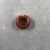  <em>Penannular Earring</em>. Red jasper, Diam. 1/4 × 11/16 in. (0.7 × 1.8 cm). Brooklyn Museum, Charles Edwin Wilbour Fund, 37.1956E. Creative Commons-BY (Photo: , CUR.37.1956E_view02.jpg)