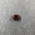  <em>Penannular Earring</em>. Red jasper, Diam. 1/4 × 9/16 in. (0.7 × 1.4 cm). Brooklyn Museum, Charles Edwin Wilbour Fund, 37.1962E. Creative Commons-BY (Photo: , CUR.37.1962E_view02.jpg)