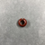  <em>Penannular Earring</em>. Red jasper, Diam. 3/16 × 9/16 in. (0.5 × 1.4 cm). Brooklyn Museum, Charles Edwin Wilbour Fund, 37.1964E. Creative Commons-BY (Photo: , CUR.37.1964E_view02.jpg)
