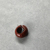  <em>Penannular Earring</em>, ca. 1539-1190 B.C.E. Red jasper, 1/4 × Diam. 1/2 in. (0.6 × 1.2 cm). Brooklyn Museum, Charles Edwin Wilbour Fund, 37.1968E. Creative Commons-BY (Photo: , CUR.37.1968E_view04.jpg)